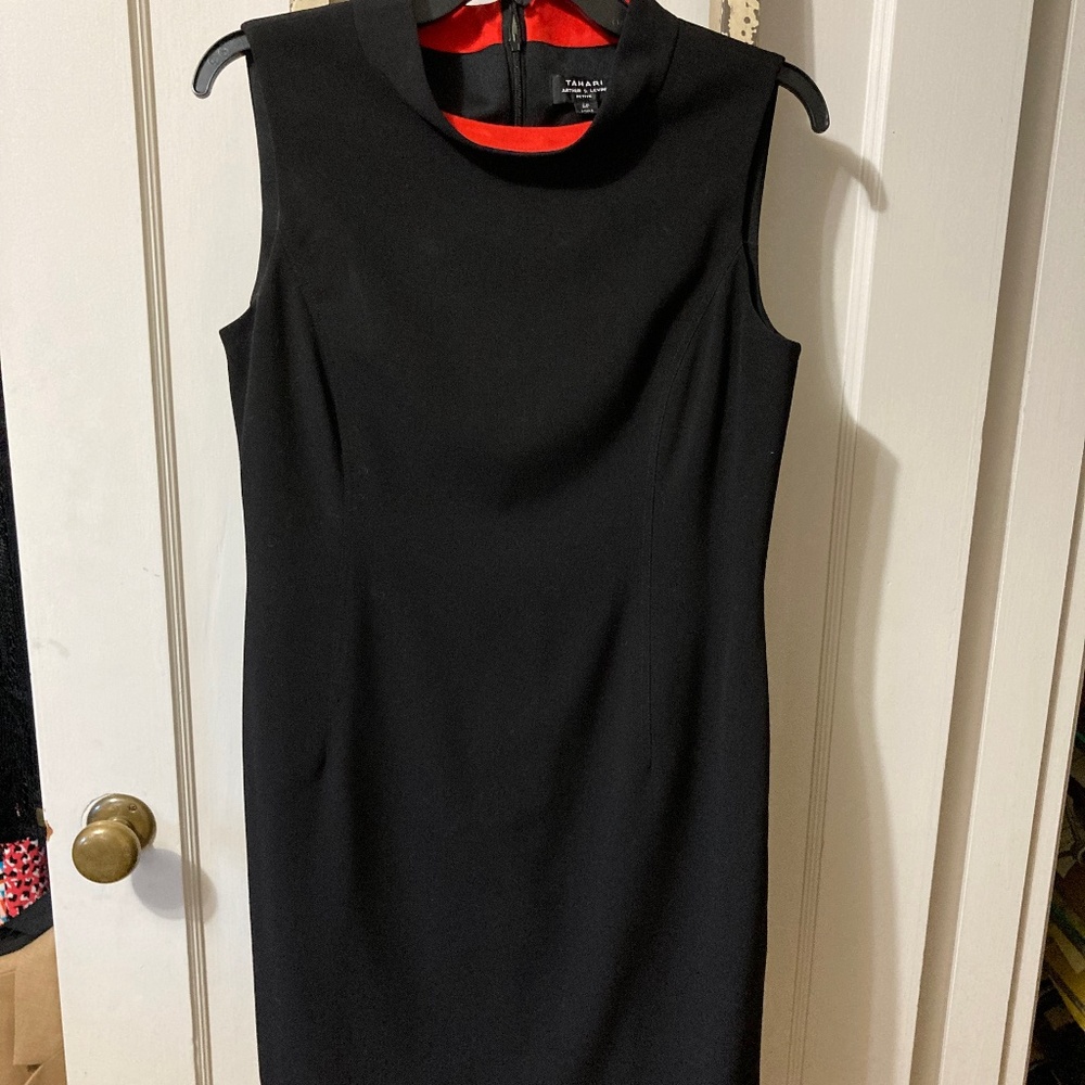 Black Tahari sleeveless dress.